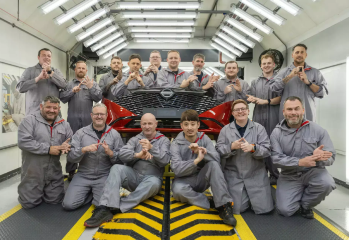 Autoworkers learn sign language to improve work and lives of deaf colleagues